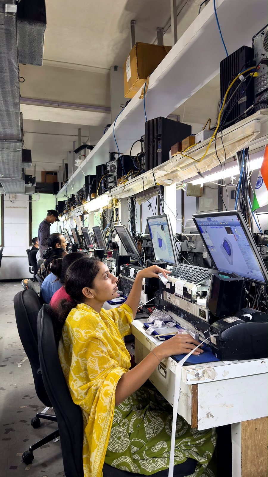 A Sahyog Diamond team member reviewing a 3D diamond scan